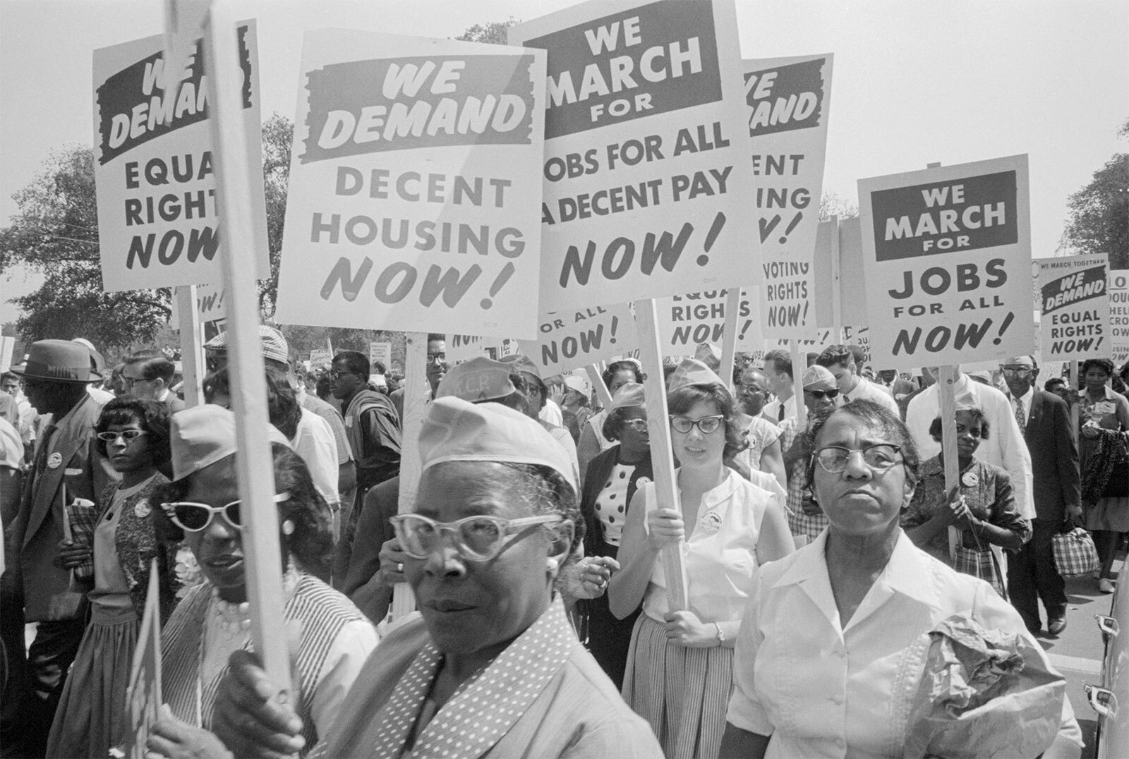 This image depicts a 1963 photograph of Black resistance to Jim Crow laws at The March on Washington on August 28, 1963.
