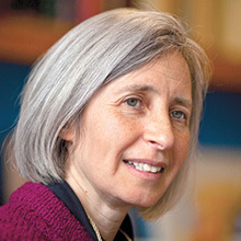 The image shows a headshot of legal scholar, author, and human rights expert, Martha Minow.